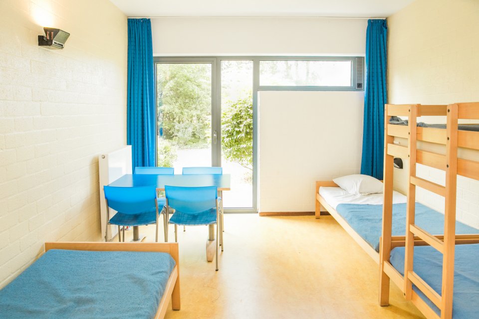 Vierpersoonskamer met eigen badkamer Vierpersoonskamer