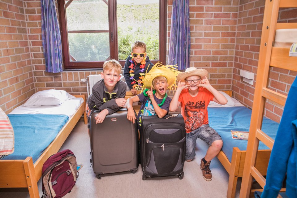 Vierpersoonskamer met eigen sanitair Kinderen in een vierpersoonskamer