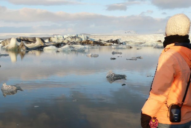 Person overlooking a lake in Iceland